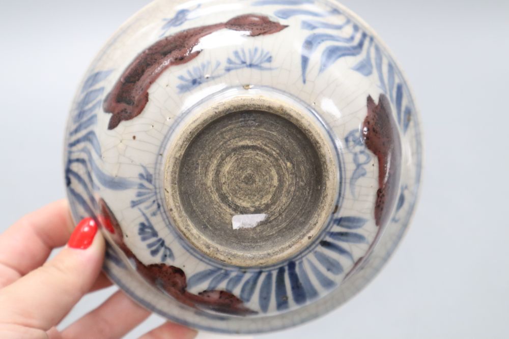 A Chinese celadon bowl, a Thai market famille rose bowl and a crackle glaze bowl